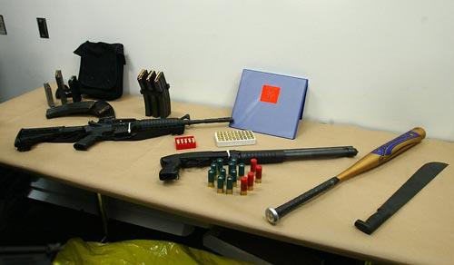 Aaron Kyle Huff's weaponry (photo (c)2006 Greg Gilbert/The Seattle Times)
