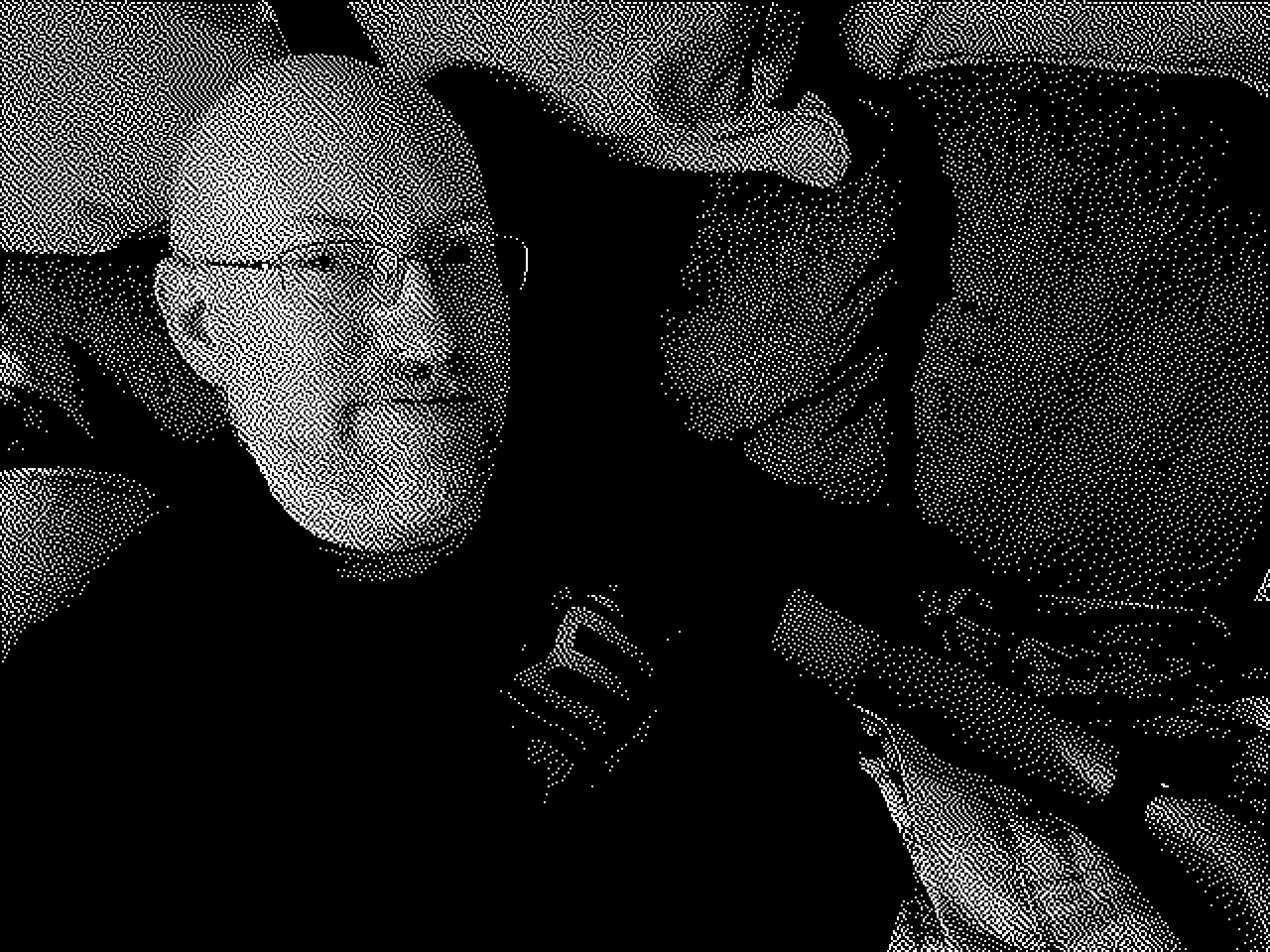 Me on a couch, in a one-bit pure black-and-white dithered photo in the style of old black-and-white Macintosh computers.