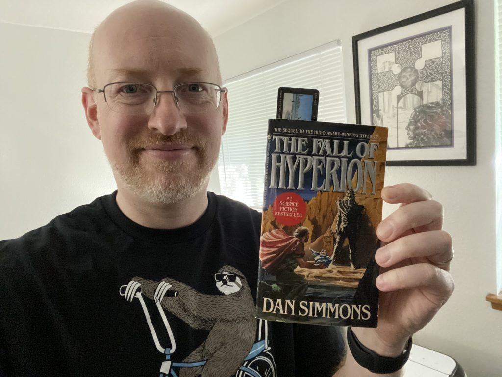 Me holding The Fall of Hyperion