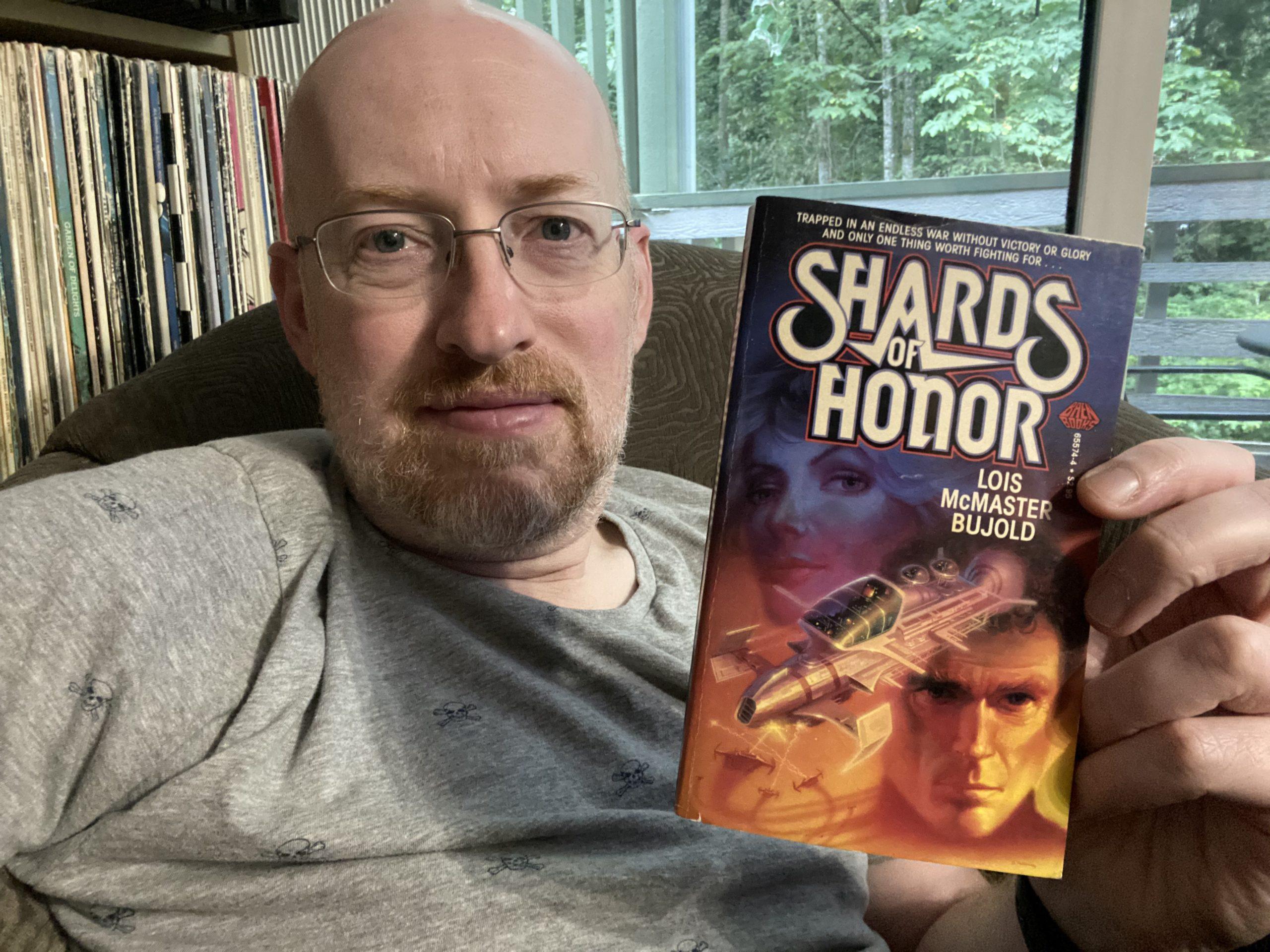 Me holding Shards of Honor