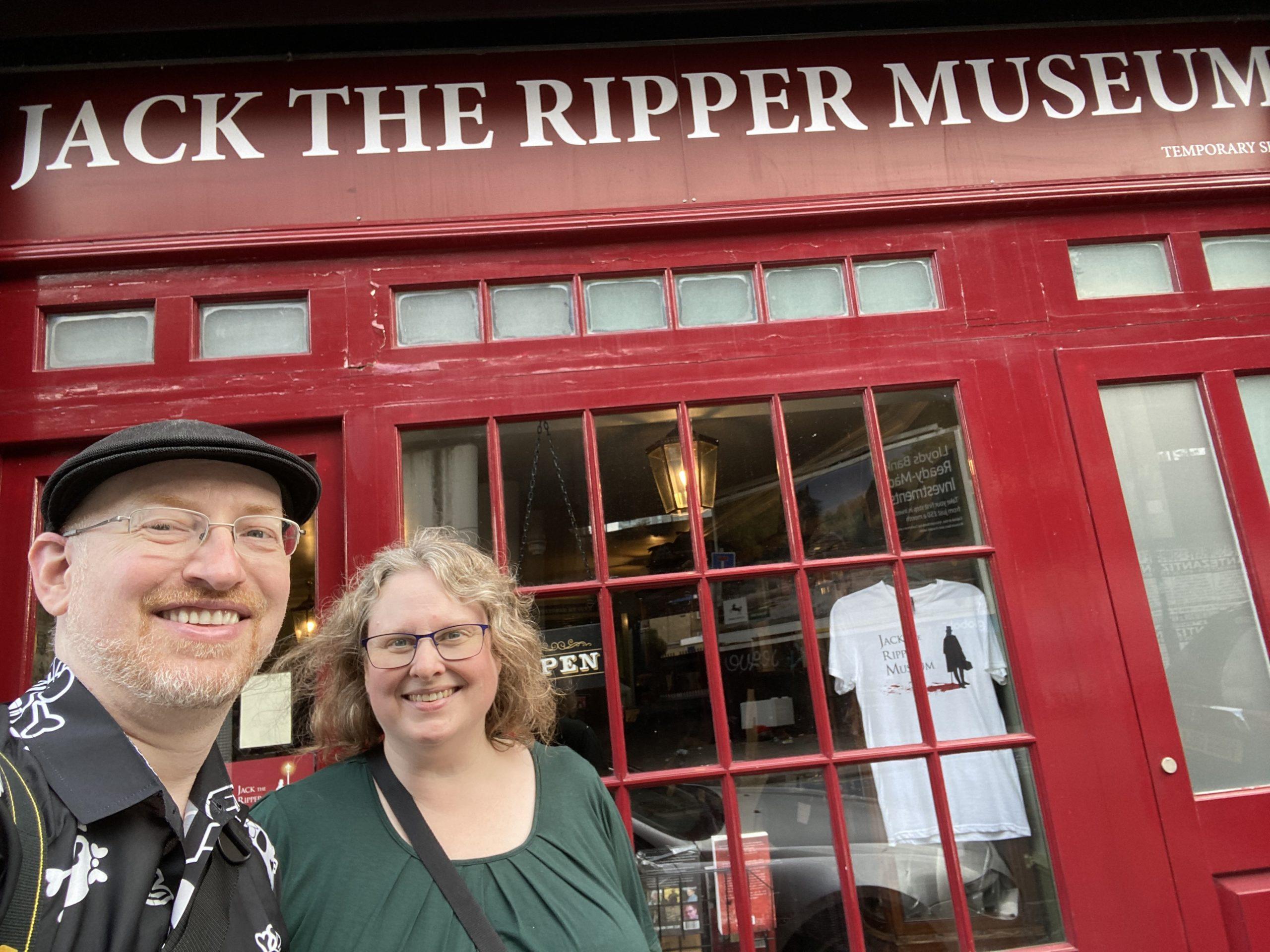 My wife and I standing in front of the Jack the Ripper Museum.