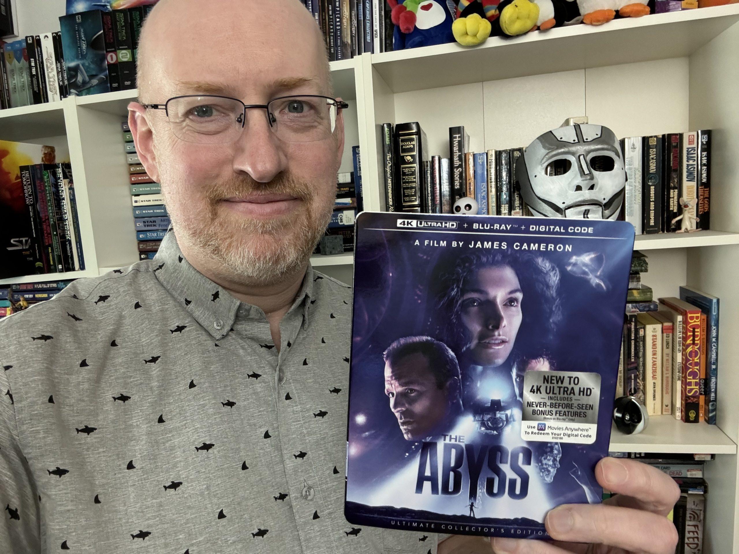 Me holding the 4K release of The Abyss.