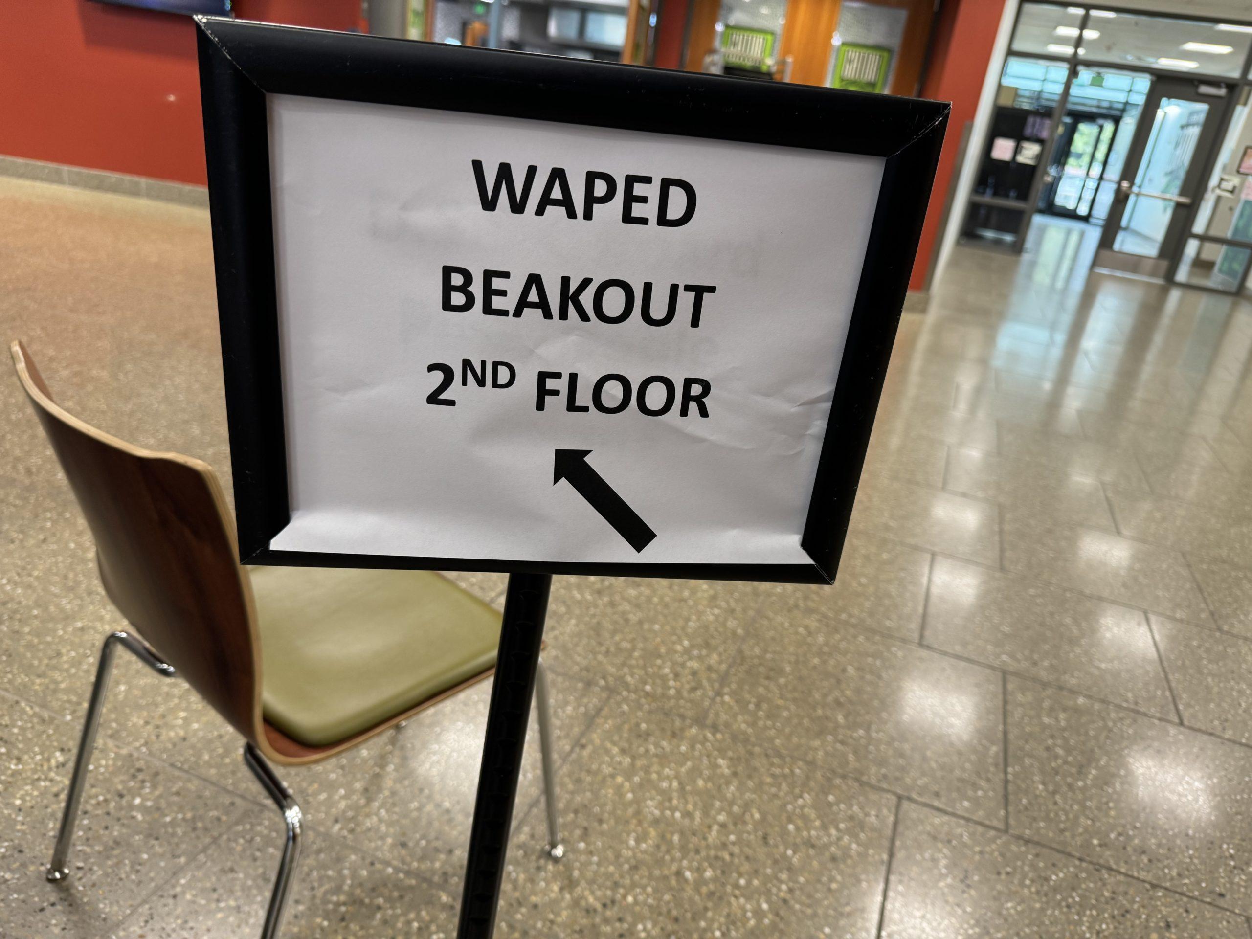 A sign that says 'WAPED BEAKOUT 2ND FLOOR'