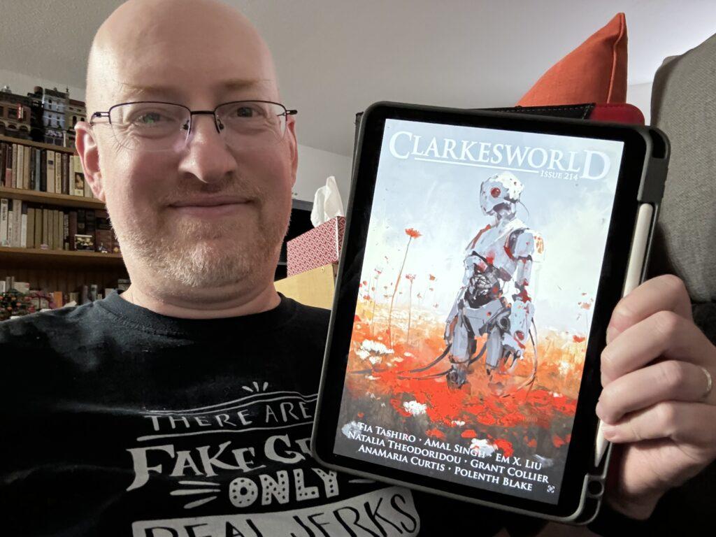 Me holding Clarkesworld 214 on my iPad