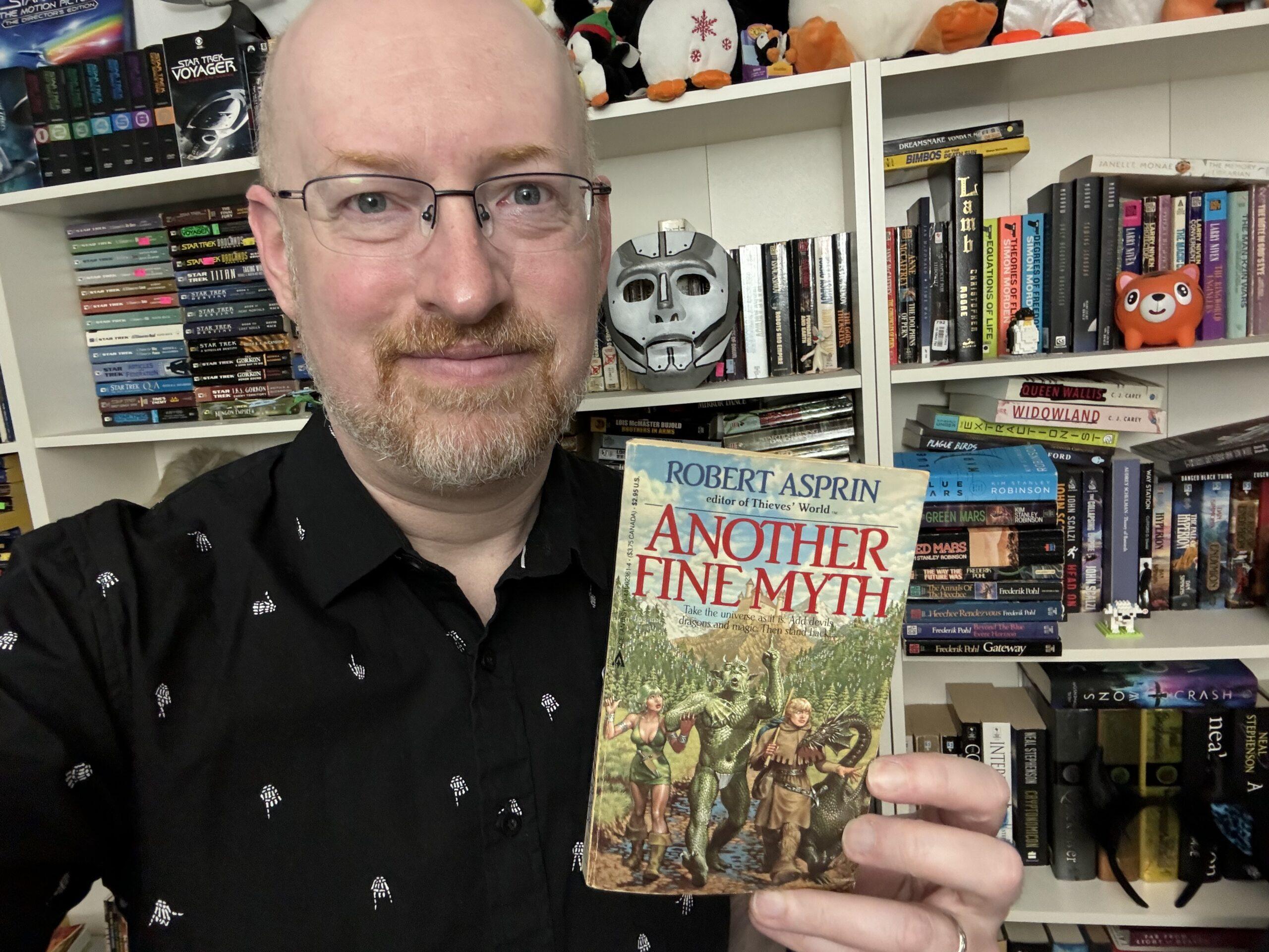 Me holding Another Fine Myth