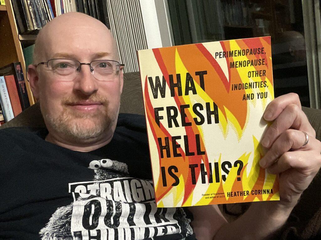 Me holding What Fresh Hell is This?