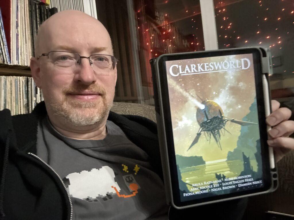 Me holding Clarkesworld Issue 216 on my iPad