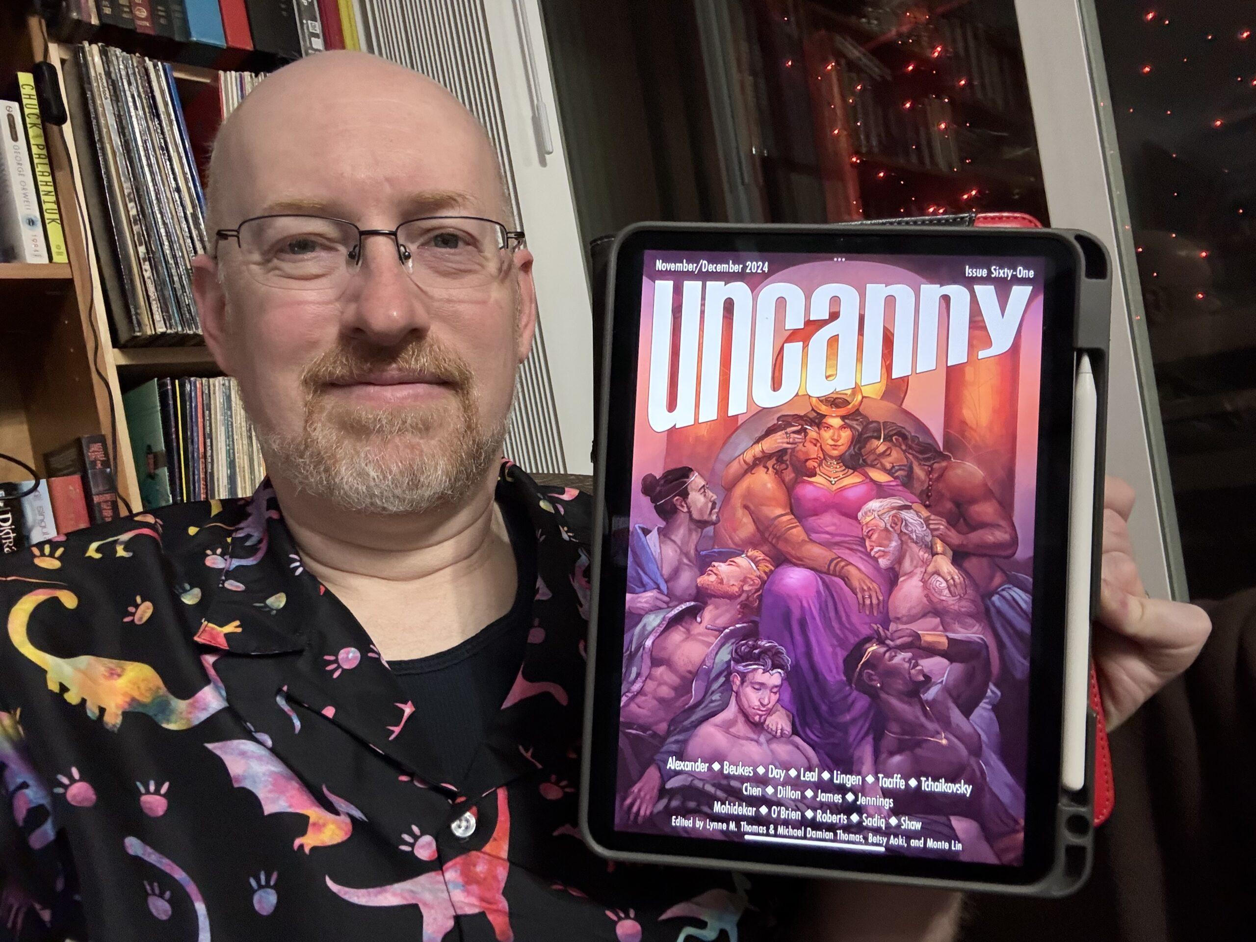 Me holding Uncanny 61 on my iPad