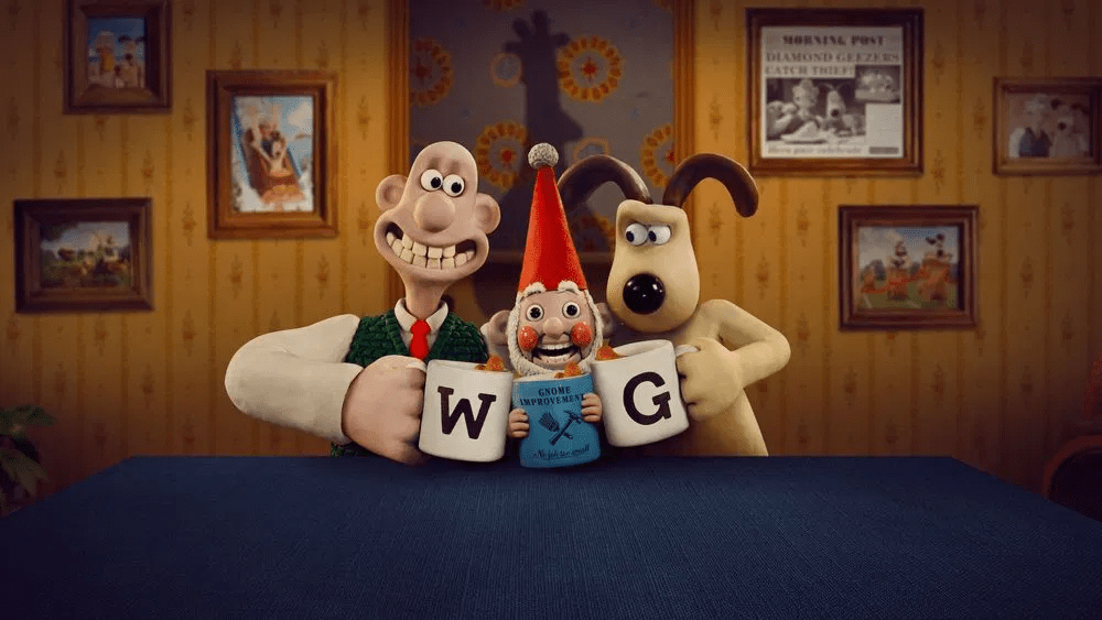 The stop-motion characters Wallace and Gromit with a smiling gnome.