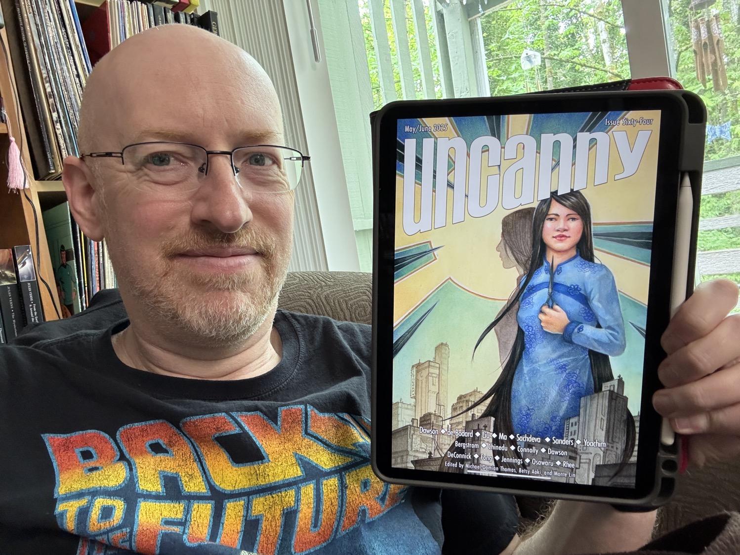 Me holding Uncanny 64 on my iPad.