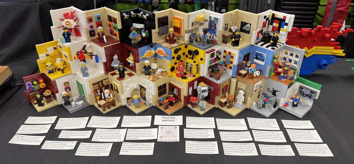 24 small Lego dioramas featuring well-known artists and their work, with cards below explaining which artist each diorama represents.