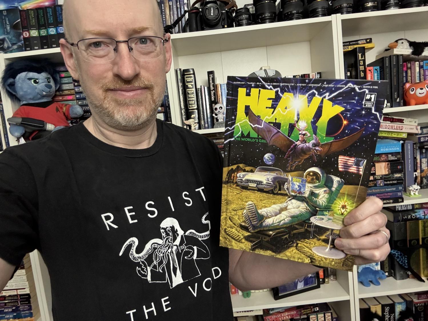 Me holding Heavy Metal relaunch issue 1