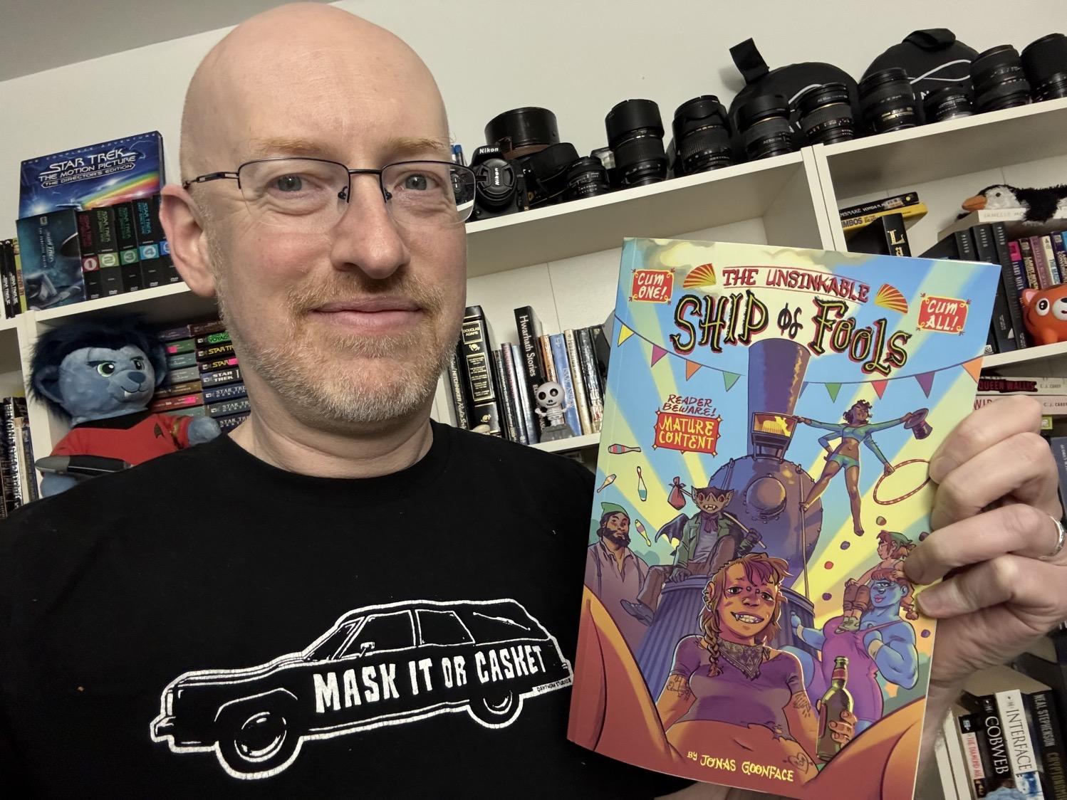 Me holding The Unsinkable Ship of Fools