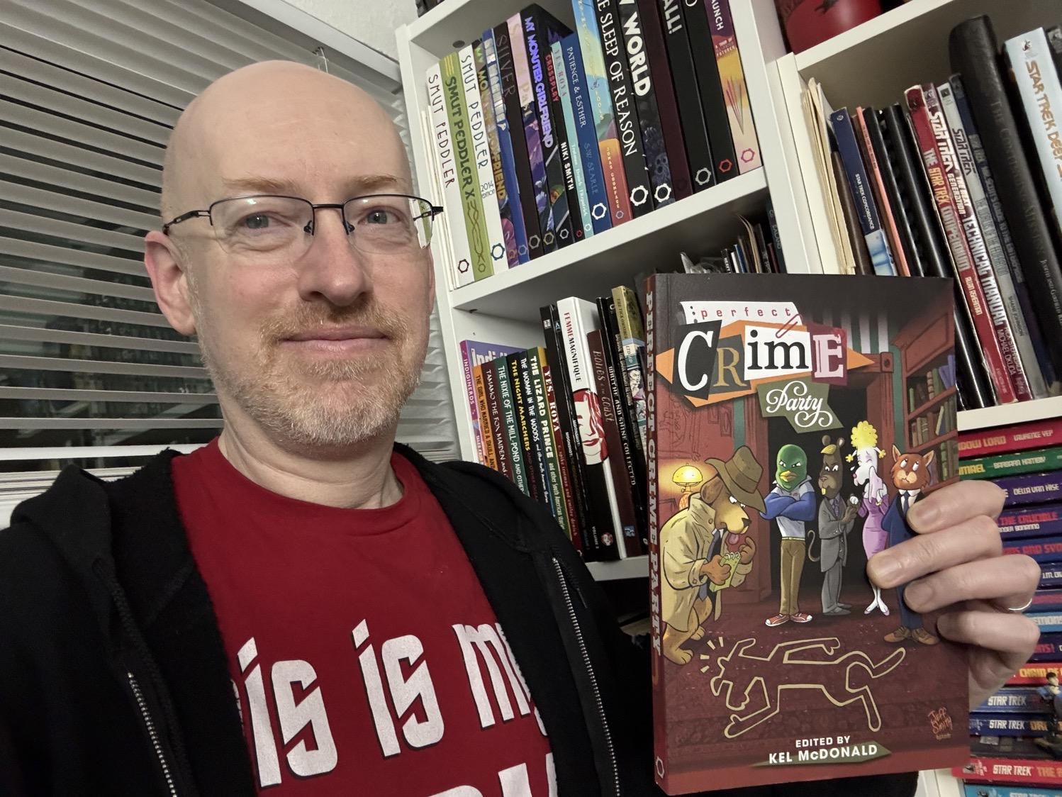 Me holding Perfect Crime Party