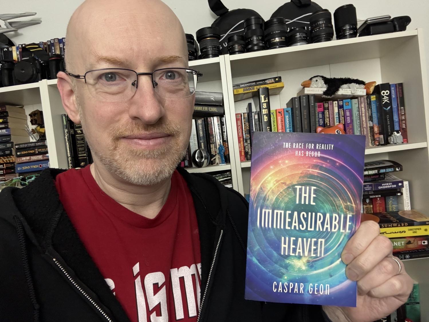 Me holding The Immeasurable Heaven