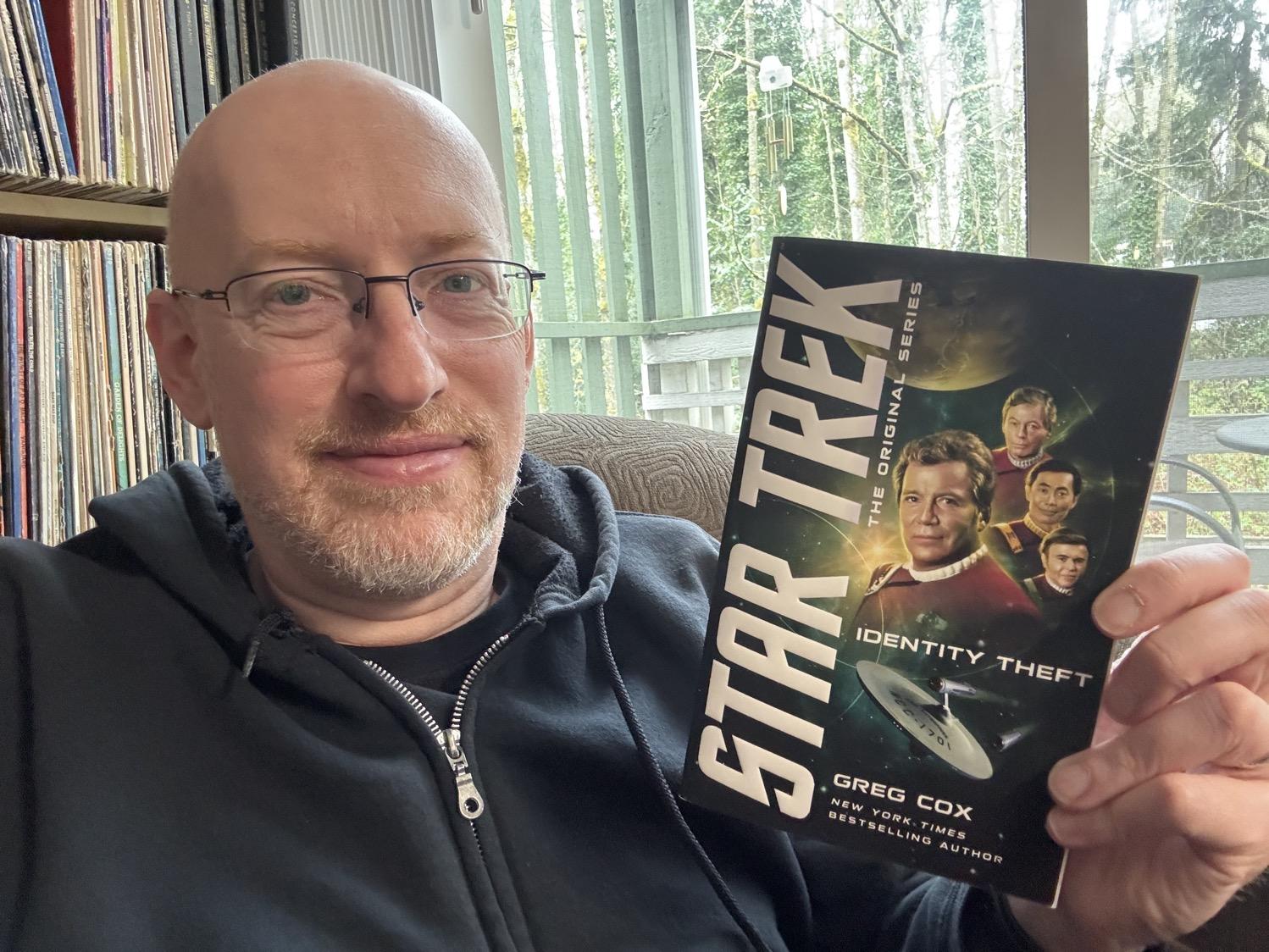 Me holding Identity Theft