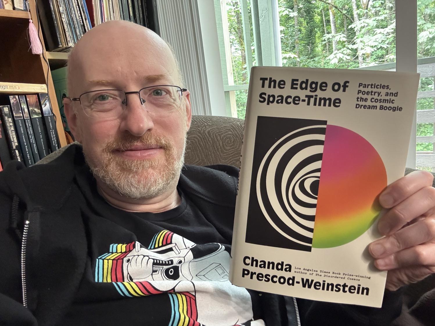 Me holding The Edge of Space-Time.