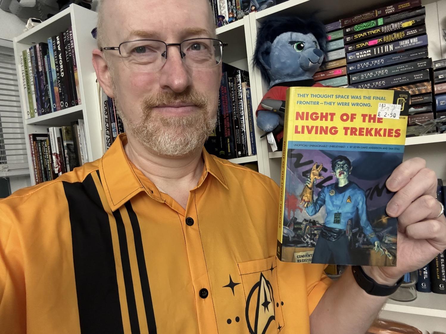 Me holding Night of the Living Trekkies.