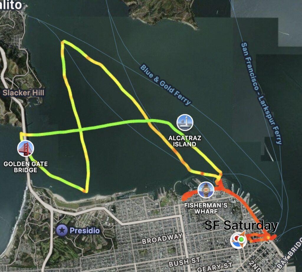 GPS tracker map of San Francisco showing our walk along the Embarcadero in red and our sail around the bay in yellows and greens.