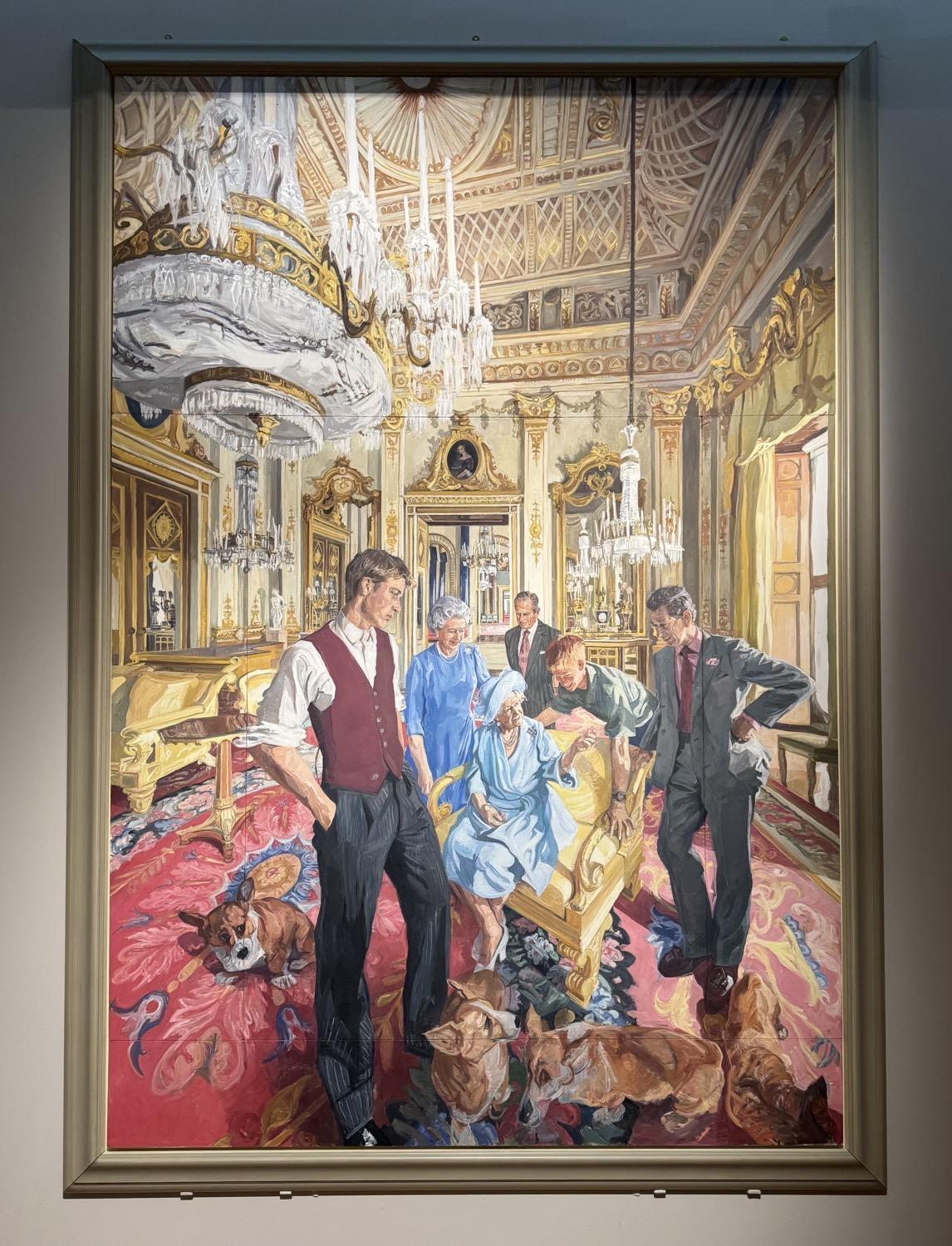 Large painting of the British royal family in an informal pose, gathered in a room with gold and white walls and ceiling and red floral patterned carpet, painted slightly distorted as if photographed with a wide-angle lens.
