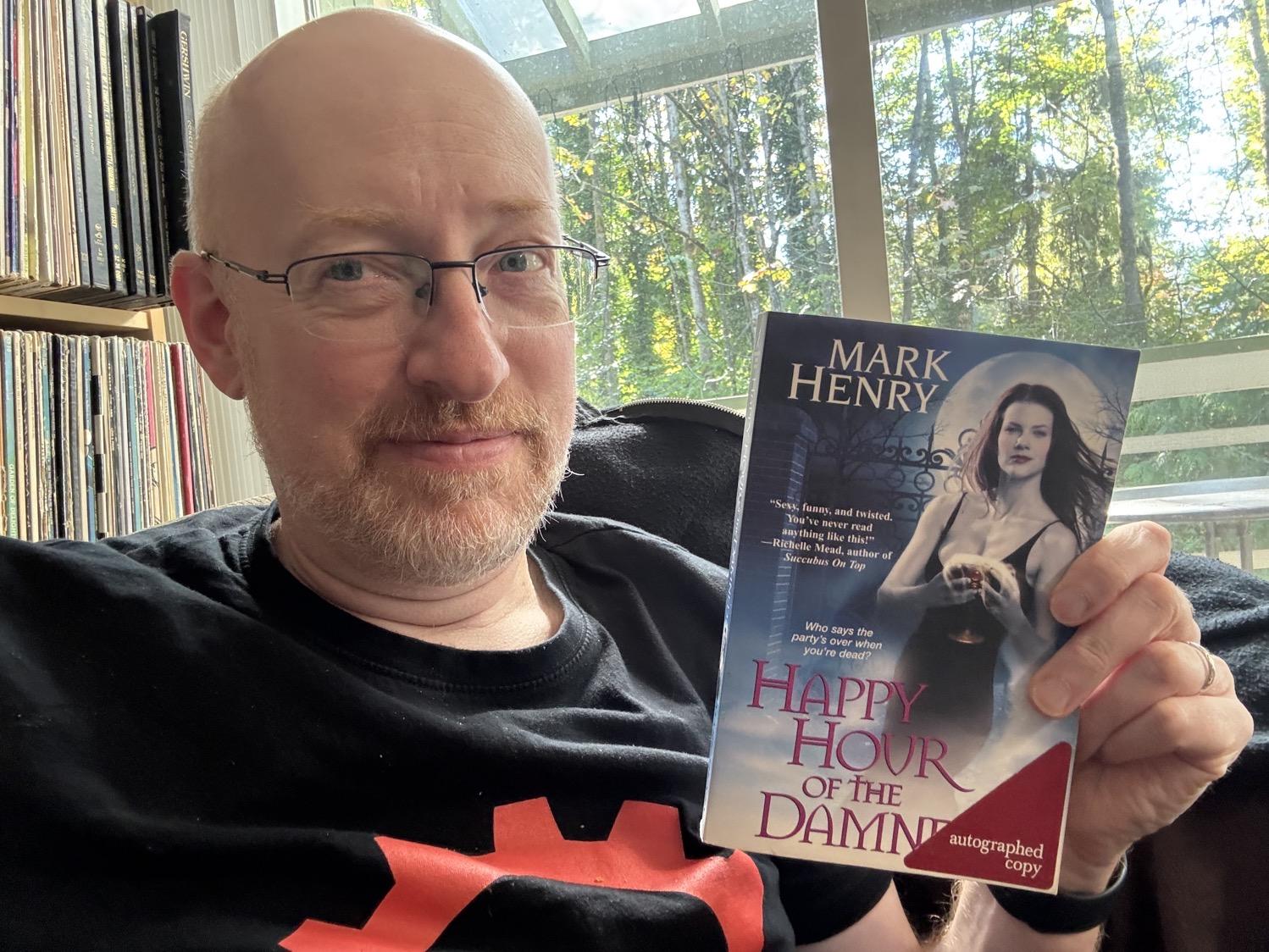 Me holding Happy Hour of the Damned